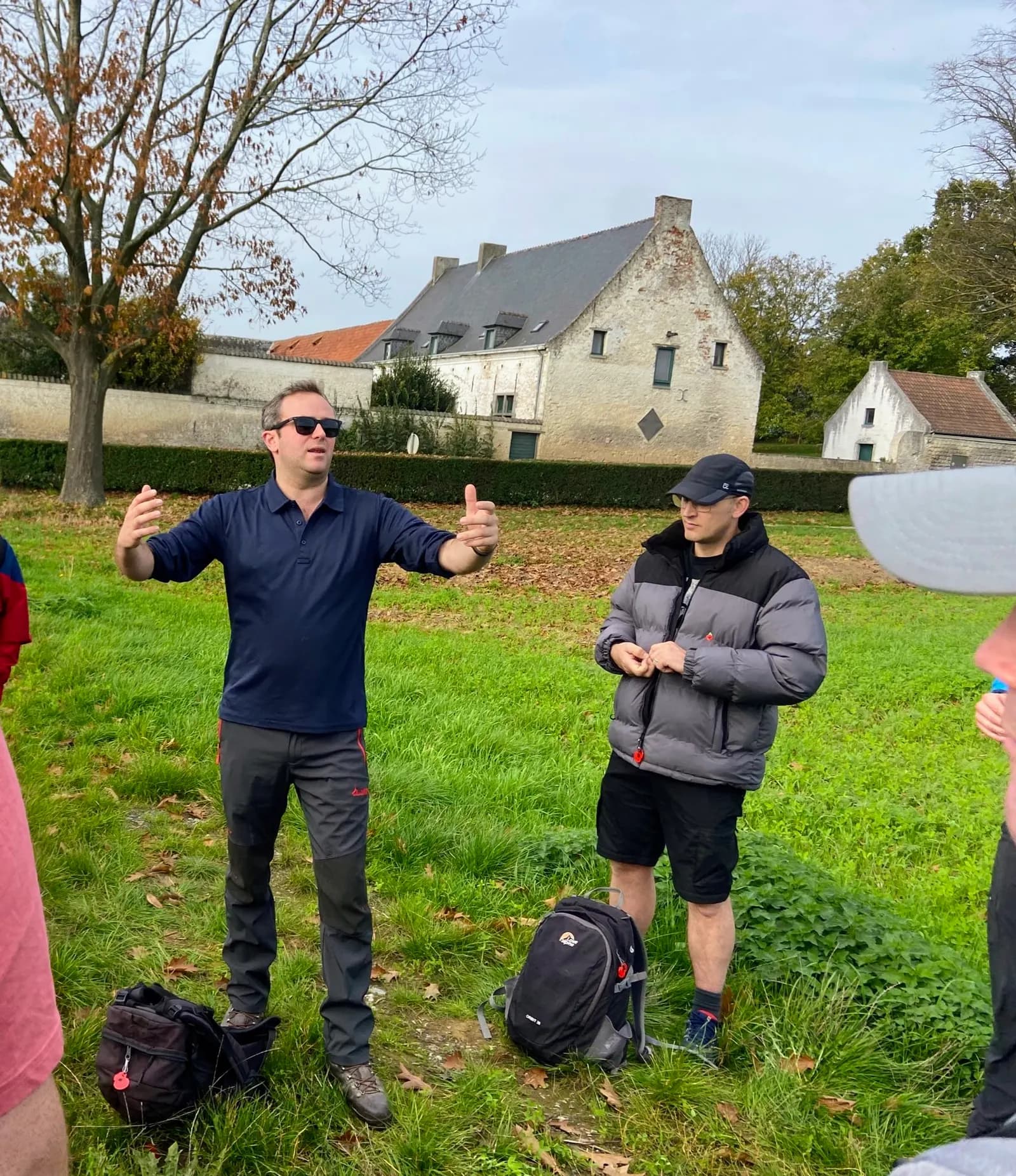 A guide explaining the battle to a group on the Waterloo battlefield